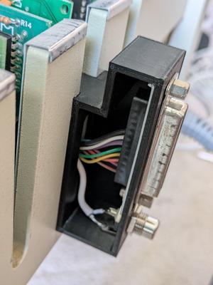 Serial port / RCA holder box with open cover